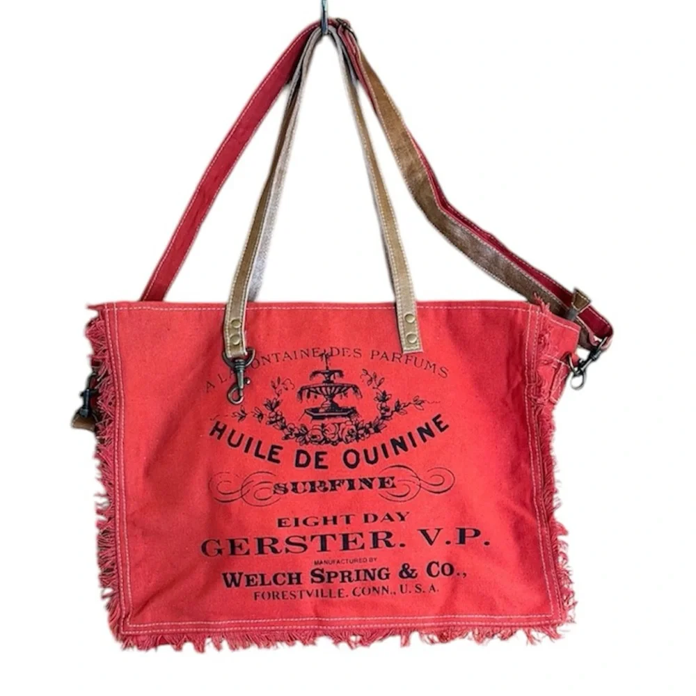 A La Fontaine Des Parfums Red & Black Fringe Tote. Shoulder & Crossbody Straps